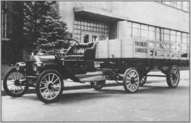 A 1911 Ford Model-T/Smith Form-A Truck Conversion tractor coupled to Fruehauf's 1914 flatbed semi-trailer. (From the collections of Henry Ford Museum & Greenfield Village.)